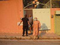 Residents are leaving their houses  during a wildfire in southern urban of Attica, Greece, on 17, July 2023. Fire fighting forces battling a...