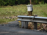 LOWER MAKEFIELD TOWNSHIP, PENNSYLVANIA, UNITED STATES - JULY 17 - Severe flooding damage and buckling roads in Lower Makefield Township, Pen...