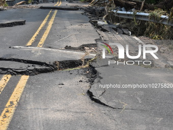 LOWER MAKEFIELD TOWNSHIP, PENNSYLVANIA, UNITED STATES - JULY 17 - Severe flooding damage and buckling roads in Lower Makefield Township, Pen...