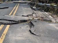 LOWER MAKEFIELD TOWNSHIP, PENNSYLVANIA, UNITED STATES - JULY 17 - Severe flooding damage and buckling roads in Lower Makefield Township, Pen...