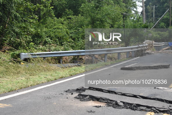 LOWER MAKEFIELD TOWNSHIP, PENNSYLVANIA, UNITED STATES - JULY 17 - Severe flooding damage and buckling roads in Lower Makefield Township, Pen...