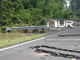 LOWER MAKEFIELD TOWNSHIP, PENNSYLVANIA, UNITED STATES - JULY 17 - Severe flooding damage and buckling roads in Lower Makefield Township, Pen...