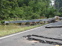 LOWER MAKEFIELD TOWNSHIP, PENNSYLVANIA, UNITED STATES - JULY 17 - Severe flooding damage and buckling roads in Lower Makefield Township, Pen...