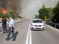 The wildfire in the central Greek region of Attica rapidly spread within 24 hours. The forest fire that ignited on Monday in the Dervenochor...