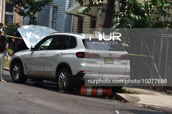 Flash flooding destroys homes, submerges cars and prompts water rescues in New Brunswick, New Jersey, United States on July 18, 2023. Flash...