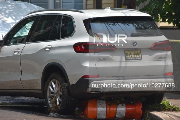 Flash flooding destroys homes, submerges cars and prompts water rescues in New Brunswick, New Jersey, United States on July 18, 2023. Flash...