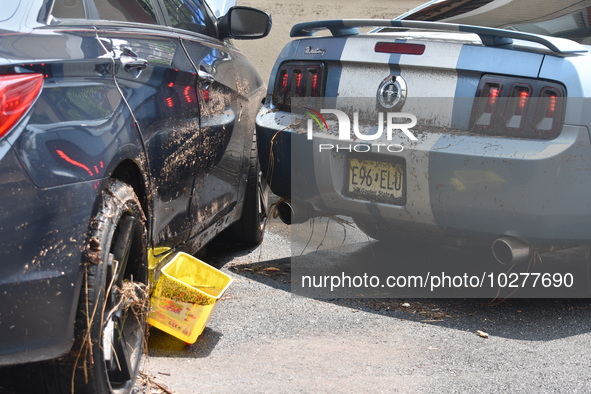 Flash flooding destroys homes, submerges cars and prompts water rescues in New Brunswick, New Jersey, United States on July 18, 2023. Flash...