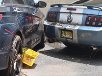 Flash flooding destroys homes, submerges cars and prompts water rescues in New Brunswick, New Jersey, United States on July 18, 2023. Flash...