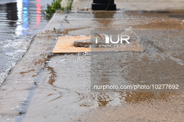 Flash flooding destroys homes, submerges cars and prompts water rescues in New Brunswick, New Jersey, United States on July 18, 2023. Flash...