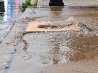 Flash flooding destroys homes, submerges cars and prompts water rescues in New Brunswick, New Jersey, United States on July 18, 2023. Flash...