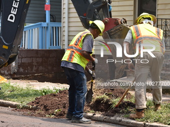 Flash flooding destroys homes, submerges cars and prompts water rescues in New Brunswick, New Jersey, United States on July 18, 2023. Flash...