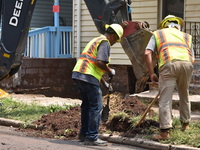 Flash flooding destroys homes, submerges cars and prompts water rescues in New Brunswick, New Jersey, United States on July 18, 2023. Flash...