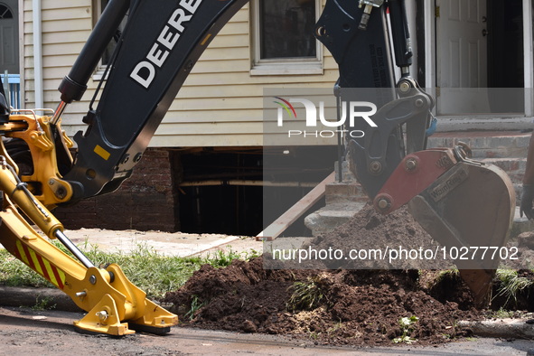 Flash flooding destroys homes, submerges cars and prompts water rescues in New Brunswick, New Jersey, United States on July 18, 2023. Flash...