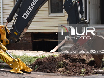 Flash flooding destroys homes, submerges cars and prompts water rescues in New Brunswick, New Jersey, United States on July 18, 2023. Flash...