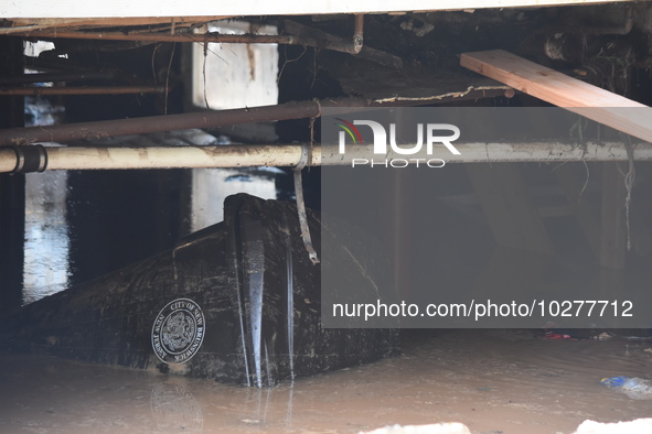 Flash flooding destroys homes, submerges cars and prompts water rescues in New Brunswick, New Jersey, United States on July 18, 2023. Flash...