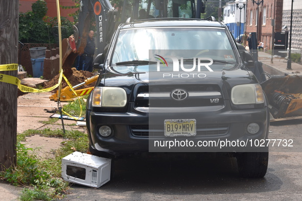 Flash flooding destroys homes, submerges cars and prompts water rescues in New Brunswick, New Jersey, United States on July 18, 2023. Flash...