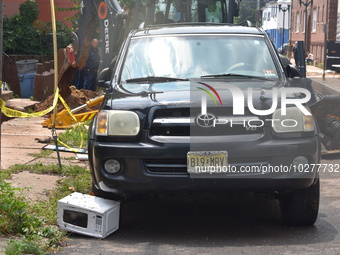 Flash flooding destroys homes, submerges cars and prompts water rescues in New Brunswick, New Jersey, United States on July 18, 2023. Flash...