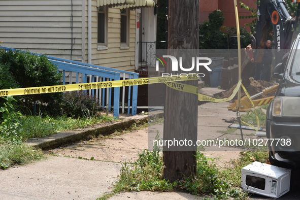 Flash flooding destroys homes, submerges cars and prompts water rescues in New Brunswick, New Jersey, United States on July 18, 2023. Flash...