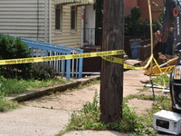 Flash flooding destroys homes, submerges cars and prompts water rescues in New Brunswick, New Jersey, United States on July 18, 2023. Flash...