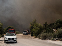 

Athens, Greece, on July 18th, 2023 - Ragind wildfires are burning several houses at Nea Zoi village of Dervenohoria. (