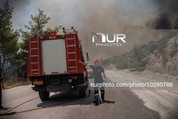 

Athens, Greece, on July 18th, 2023, Greek firefighters are trying to block the wildfire from its way from Dervenohoria to the forest of Pa...