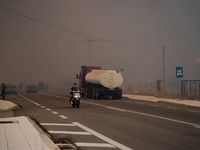 

Athens, Greece, on July 18th, 2023, a thick smoke cloud is hovering during the Dervenohoria wildfire. (