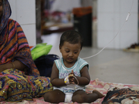 A child suffering from dengue fever being treated at a government hospital in Dhaka, Bangladesh on July 20. 2023. More than 100 people have...