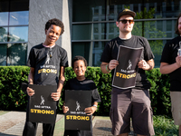 Malachi (left) and Kendrick White picket a Barbie screening with SAG-AFTRA actors and other union members.  The two brothers, ages 13, and 6...