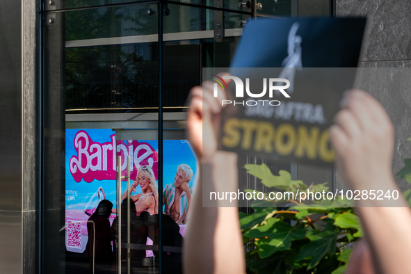 SAG-AFTRA actors and other union members picket a Barbie screening in Washington, DC.  Actors began their strike July 14, 2023, after contra...