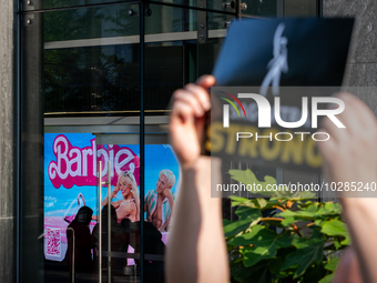 SAG-AFTRA actors and other union members picket a Barbie screening in Washington, DC.  Actors began their strike July 14, 2023, after contra...