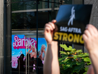 SAG-AFTRA actors and other union members picket a Barbie screening in Washington, DC.  Actors began their strike July 14, 2023, after contra...