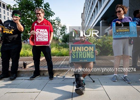 SAG-AFTRA actors and other union members picket a Barbie screening in Washington, DC.  Actors began their strike July 14, 2023, after contra...