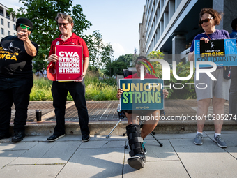 SAG-AFTRA actors and other union members picket a Barbie screening in Washington, DC.  Actors began their strike July 14, 2023, after contra...