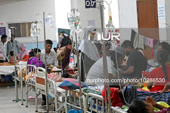 

Patients suffering from dengue fever are being treated inside the Mugdha General Hospital's admission section in Dhaka, Bangladesh on July...