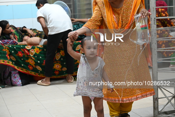 

Patients suffering from dengue fever are being treated inside the Mugdha General Hospital's admission section in Dhaka, Bangladesh on July...