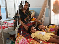 

Patients suffering from dengue fever are being treated inside the Mugdha General Hospital's admission section in Dhaka, Bangladesh on July...