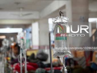 

Patients suffering from dengue fever are being treated inside the Mugdha General Hospital's admission section in Dhaka, Bangladesh on July...