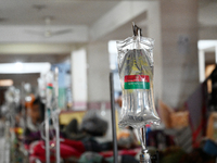 

Patients suffering from dengue fever are being treated inside the Mugdha General Hospital's admission section in Dhaka, Bangladesh on July...