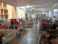 

Patients suffering from dengue fever are being treated inside the Mugdha General Hospital's admission section in Dhaka, Bangladesh on July...