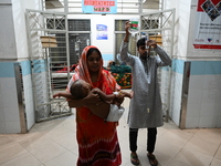 

Patients suffering from dengue fever are being treated inside the Mugdha General Hospital's admission section in Dhaka, Bangladesh on July...