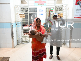 

Patients suffering from dengue fever are being treated inside the Mugdha General Hospital's admission section in Dhaka, Bangladesh on July...