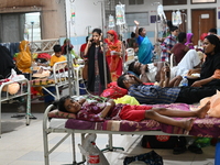 

Patients suffering from dengue fever are being treated inside the Mugdha General Hospital's admission section in Dhaka, Bangladesh on July...