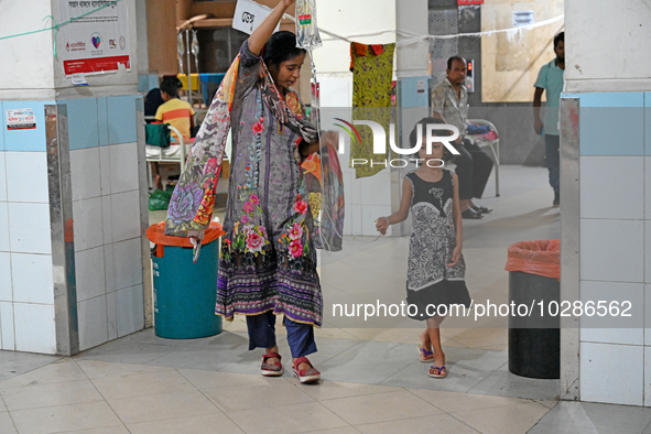 

Patients suffering from dengue fever are being treated inside the Mugdha General Hospital's admission section in Dhaka, Bangladesh on July...