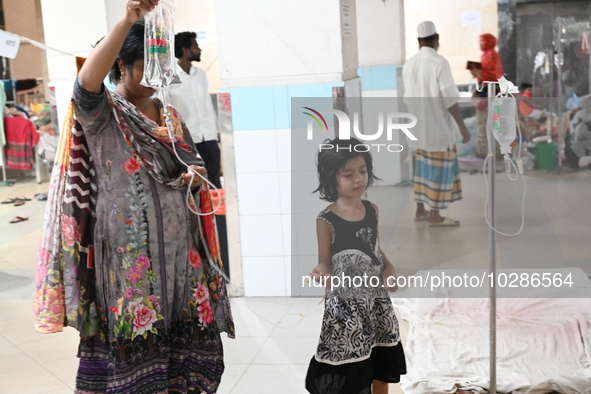 

Patients suffering from dengue fever are being treated inside the Mugdha General Hospital's admission section in Dhaka, Bangladesh on July...