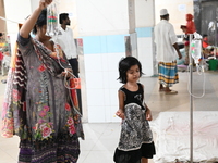 

Patients suffering from dengue fever are being treated inside the Mugdha General Hospital's admission section in Dhaka, Bangladesh on July...