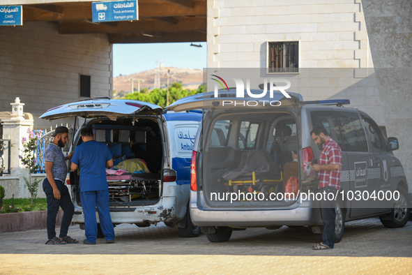 On the morning of July 26, 2023, dozens of Syrian patients at the Bab al-Hawa border crossing with Turkey prepared to enter Turkish territor...