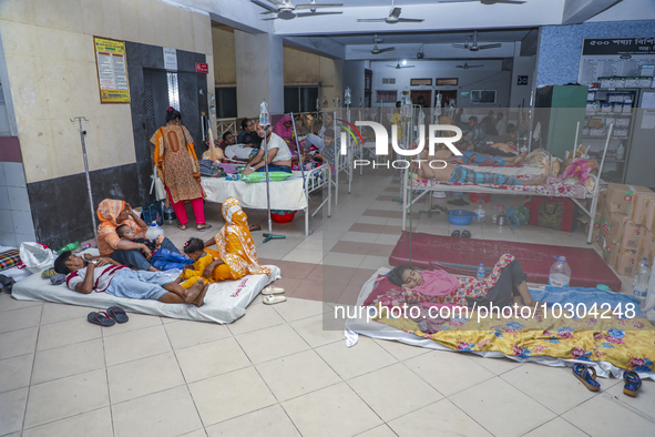 People suffering from dengue fever as they admitted for treatment at a government hospital in Dhaka, Bangladesh, on July 26, 2023. The dengu...