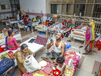 People suffering from dengue fever as they admitted for treatment at a government hospital in Dhaka, Bangladesh, on July 26, 2023. The dengu...