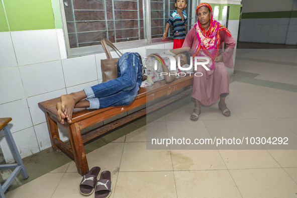 People suffering from dengue fever as they admitted for treatment at a government hospital in Dhaka, Bangladesh, on July 26, 2023. The dengu...