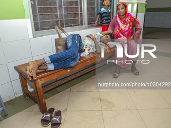 People suffering from dengue fever as they admitted for treatment at a government hospital in Dhaka, Bangladesh, on July 26, 2023. The dengu...